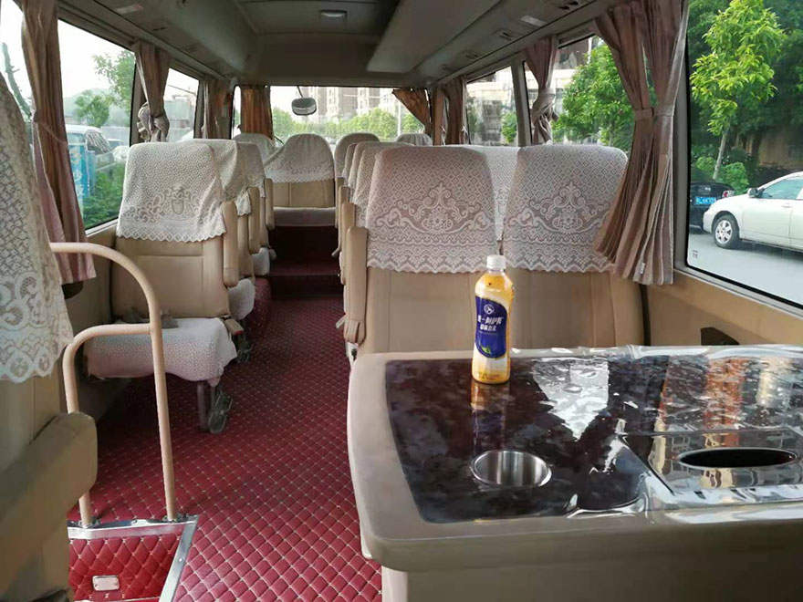 Rent a 23/18 seat Coaster minibus with a driver in Guangzhou,Guangdong