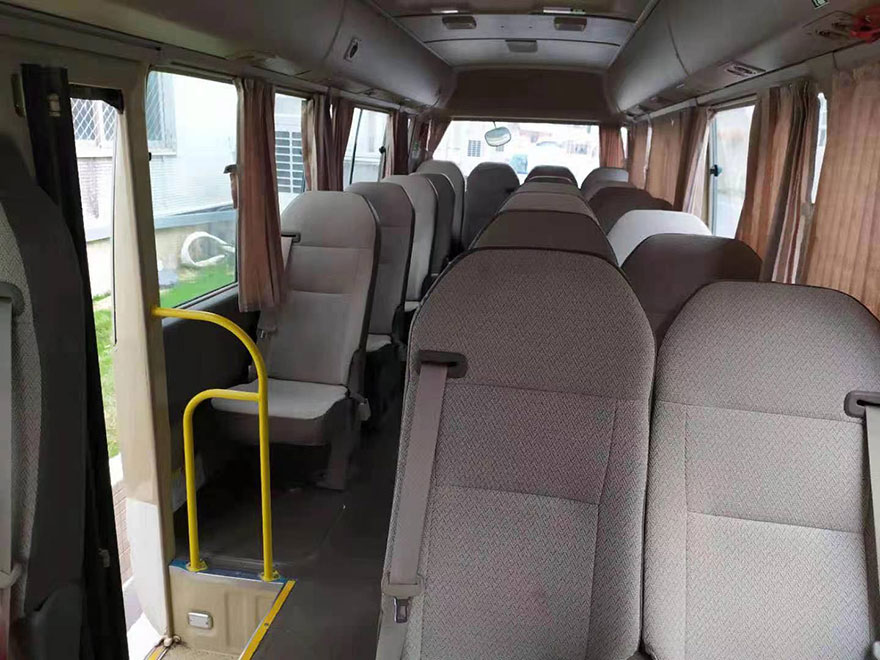 Guangzhou equipped driver rental 23 seat Toyota Coaster minibus rental company