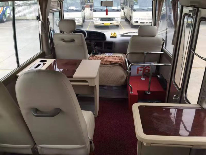 Guangzhou equipped driver rental 23 seat Toyota Coaster minibus rental company