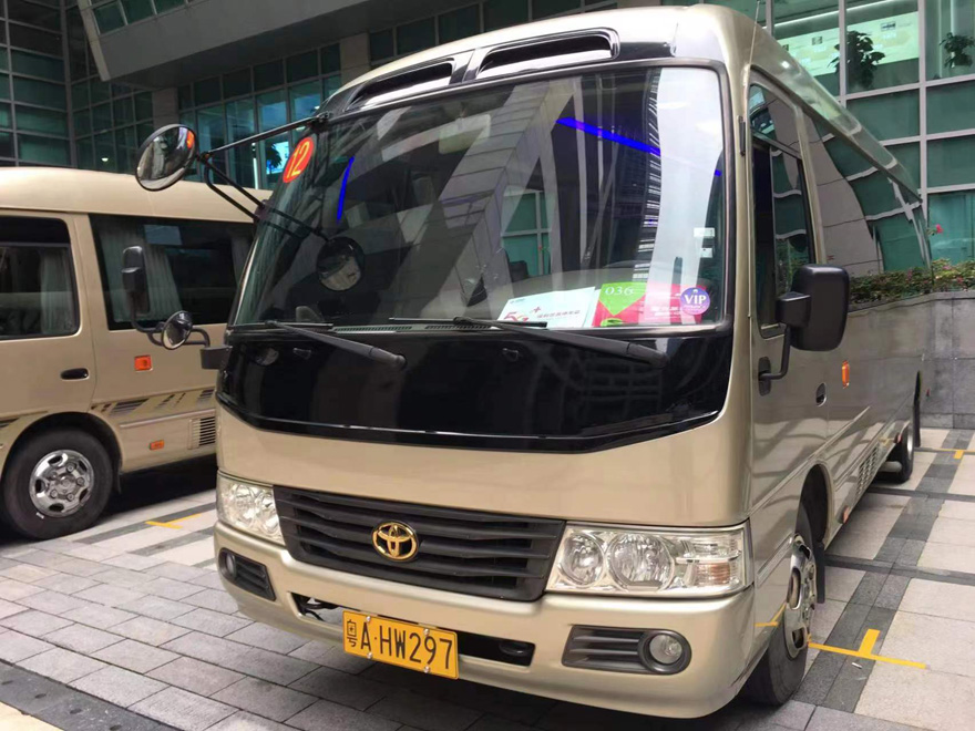 Rent luxury Toyota Coaster minibus with driver in Guangzhou city area