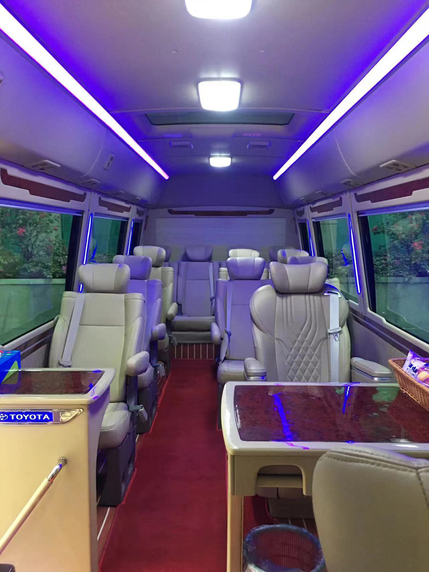 Rent luxury Toyota Coaster minibus with driver in Guangzhou city area