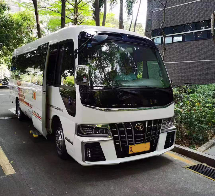 Rent a 12 seater super luxury Toyota Coaster minibus with a driver in the urban area of Guangzhou, Guangdong