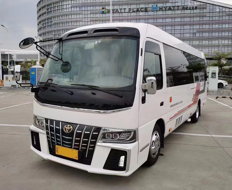 Rent a 12 seater super luxury Toyota Coaster minibus with a driver in the urban area of Guangzhou, Guangdong